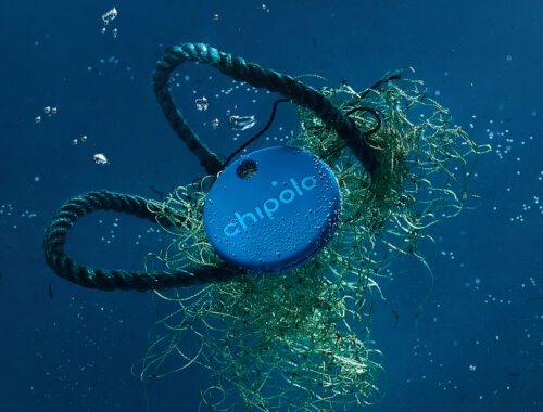 Chipolo One: Ocean Edition floating in the water and tangled in nets