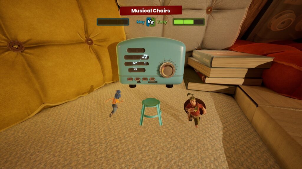 Two Dolls dancing around a chair