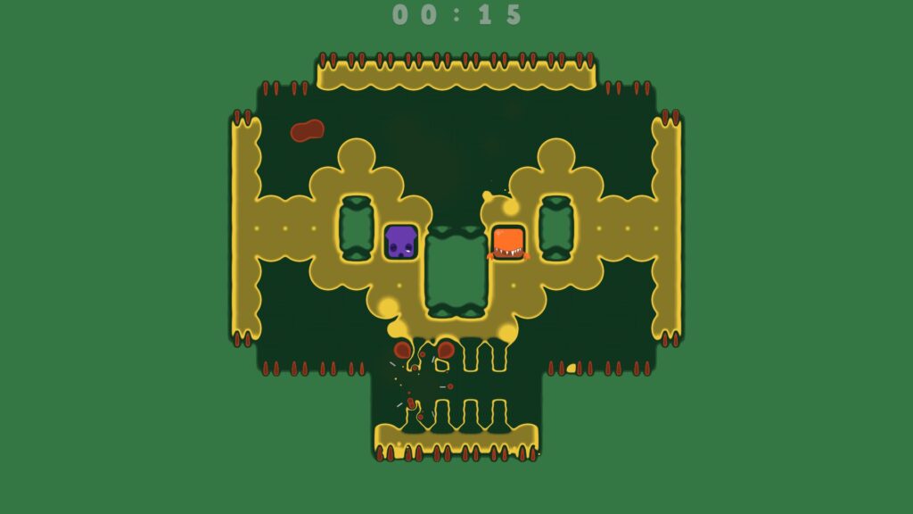 Two spitlings float in the middle of a skull-shaped level.
