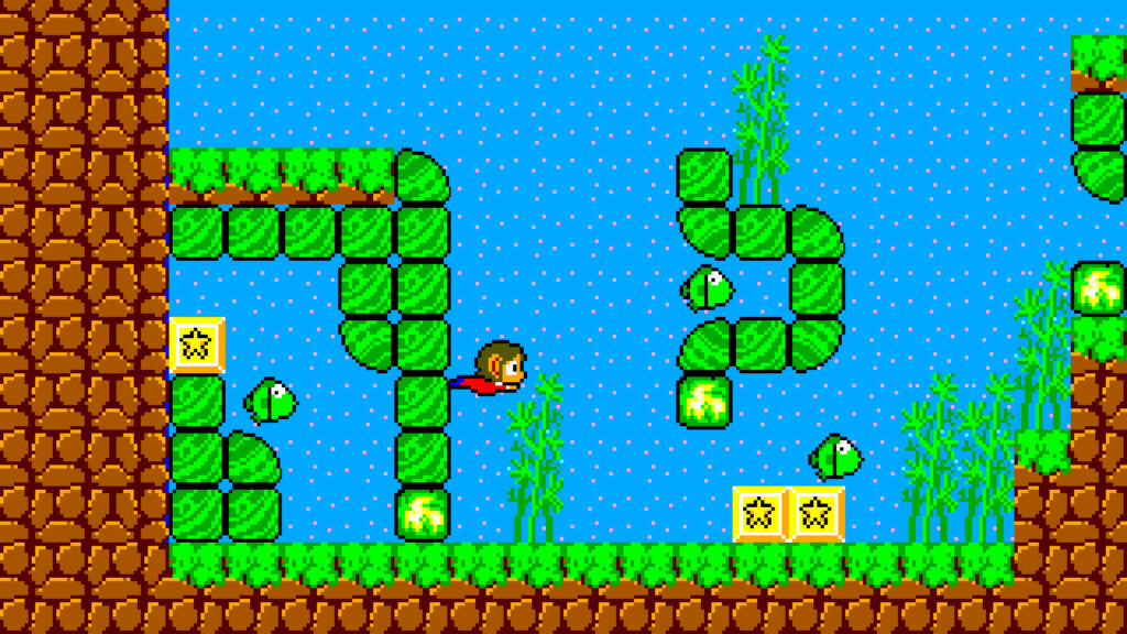 Alex Kidd swimming in a marine environment around fish and some mossy rock. You can switch between classic and remastered visuals at the press of a button
