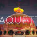 Game key art that features the Maquette logo with a colourful dome in the background.