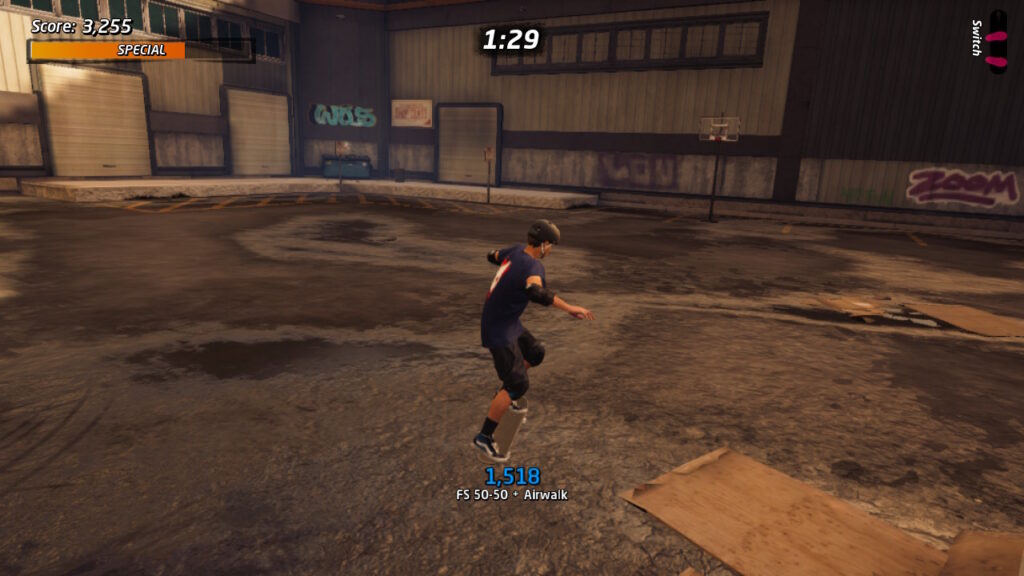 tony hawk skating in a parking lot with a muddy basketball net in the background, nearly impossible to see details