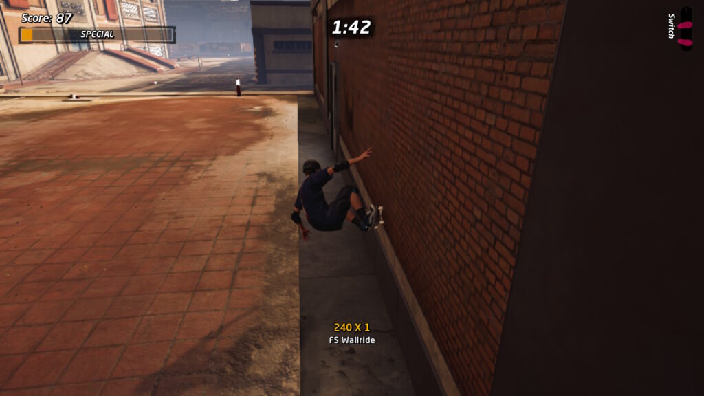 Tony hawk doing a FS Wallride off a brick wall
