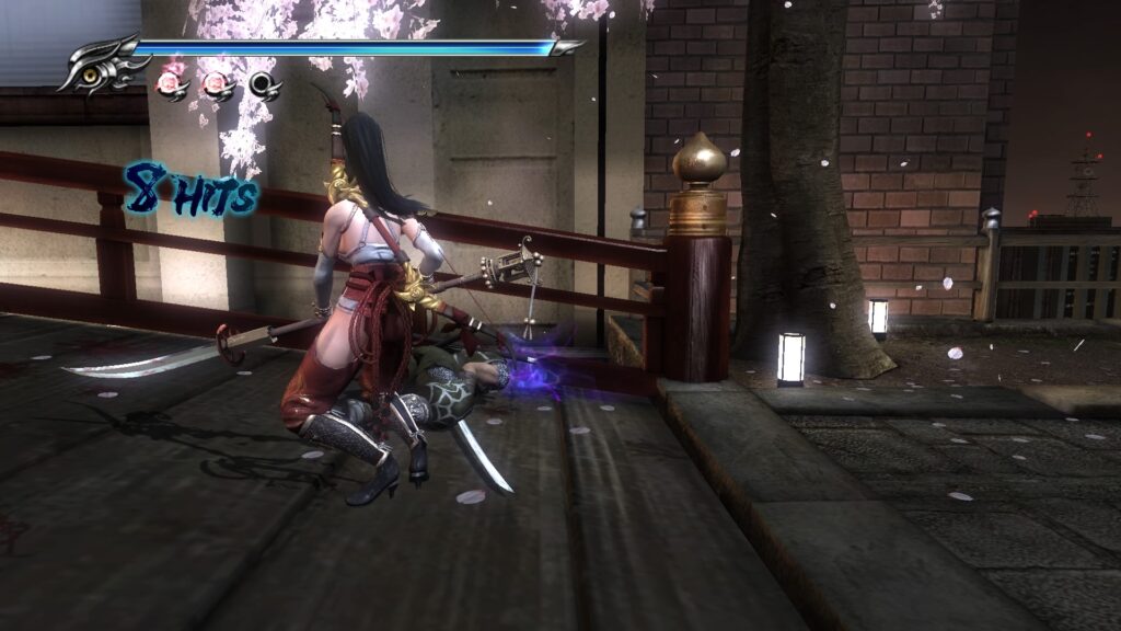 Momji walking around a dead body in Ninja Gaiden Sigma 2