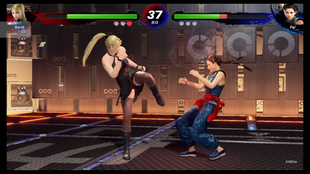 Sarah about to kick Pai in the chest.