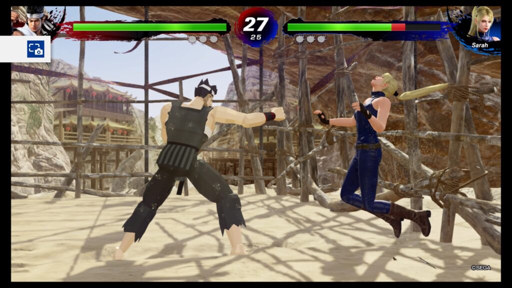 Akira in his virtua fighter costume punched sarah into the wall and she is ricocheting
