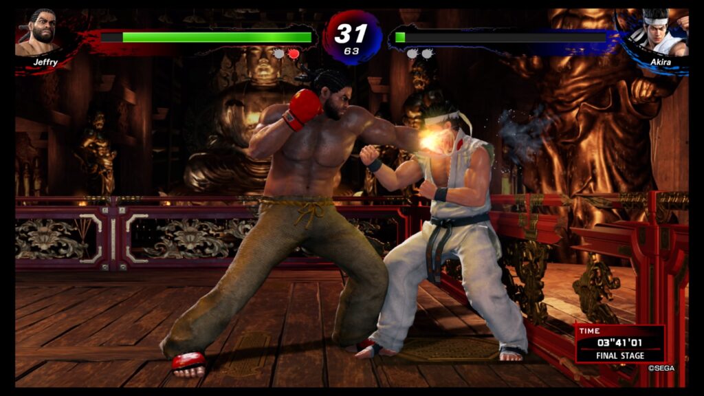 Jeffry punching akira with his left hand