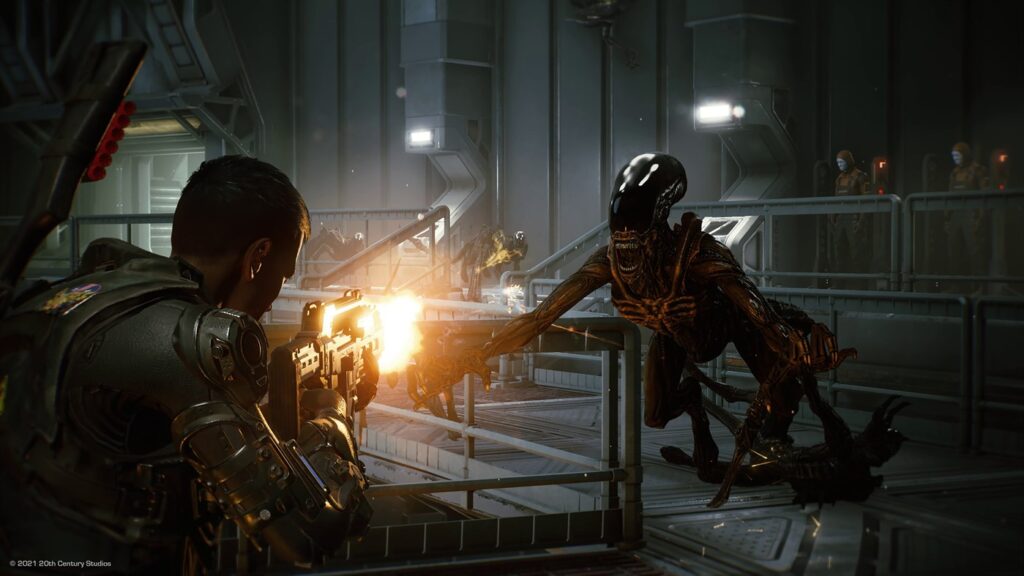 A xenomorph pounces towards a space marine who opens fire on it with his gun.