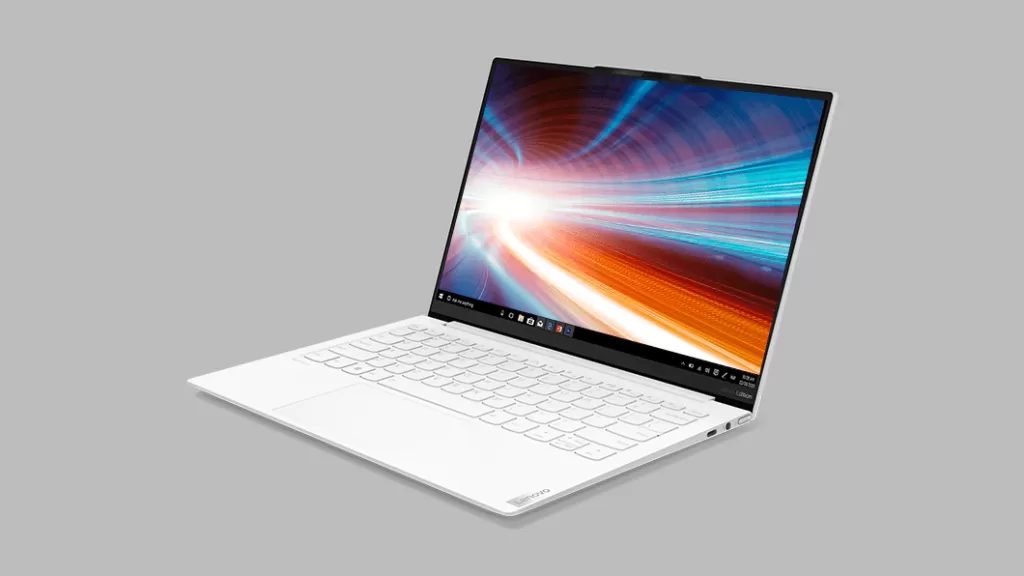 The Yoga Slim 7i facing to the left on grey background.