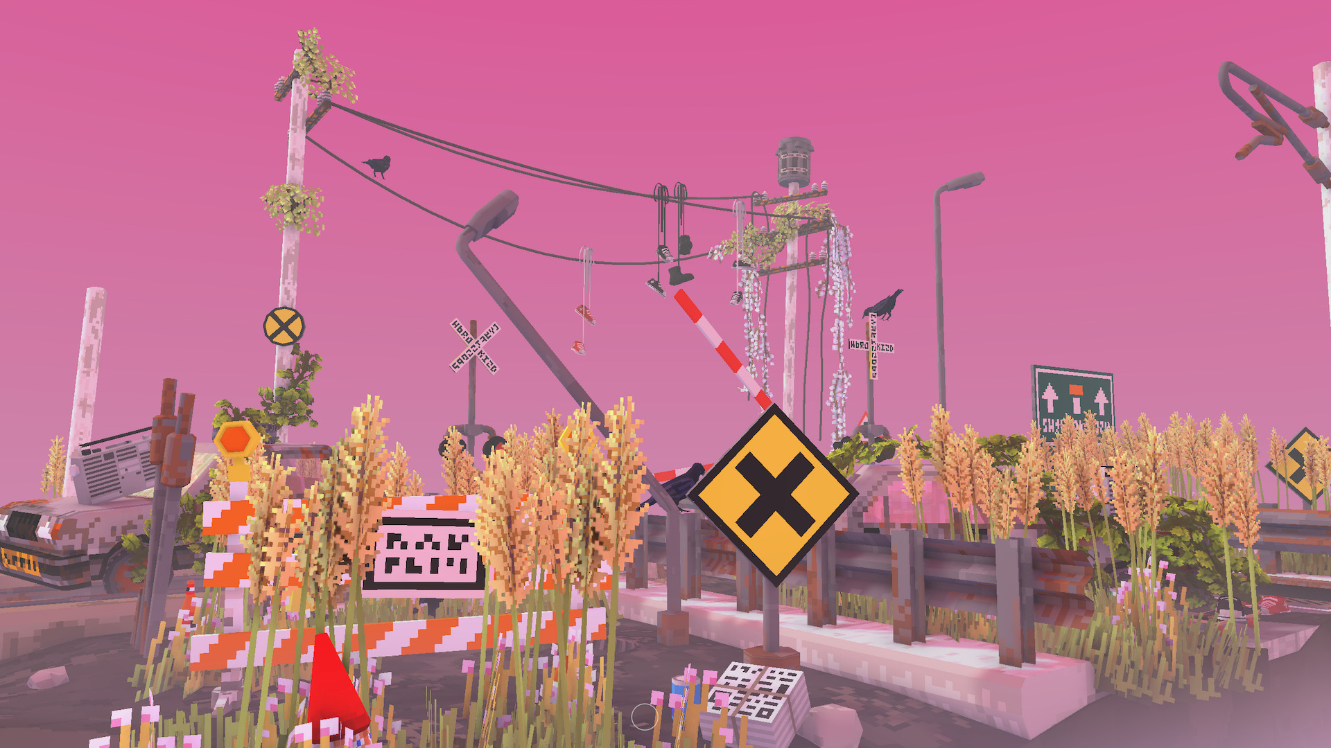 An abandoned train track overgrown with long grass, with a yellow sign in the foreground and electrical wires in the back.