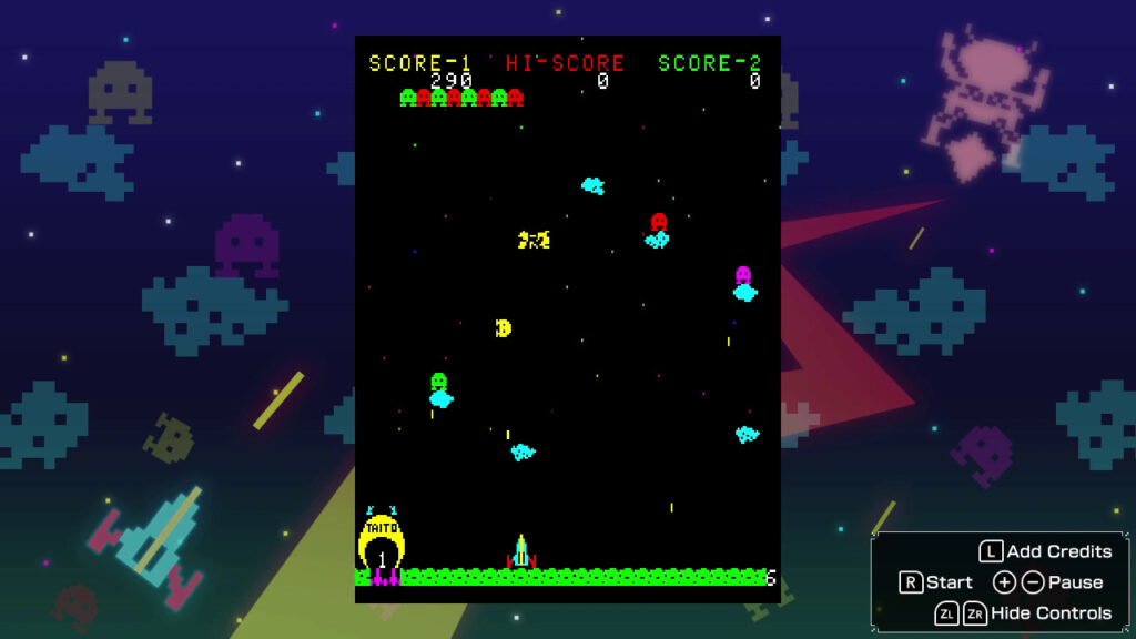 Invaders descend the screen at various heights on a black background, below is a defender