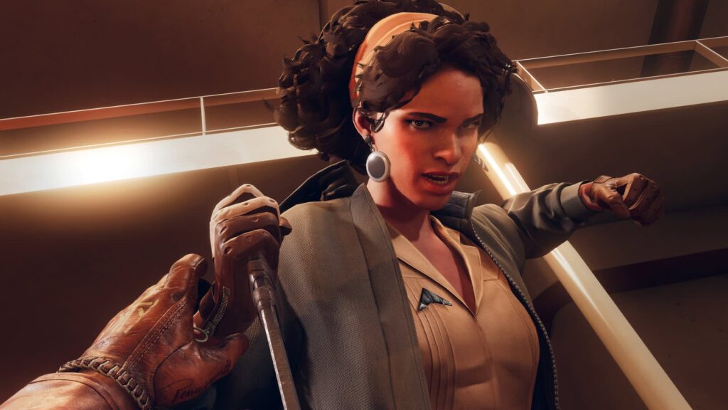 A woman is holding a knife with an angry facial expression