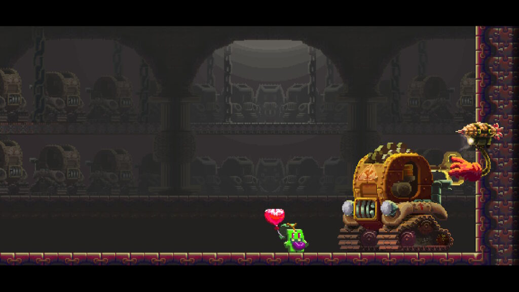 mombo facing a massive steel machine