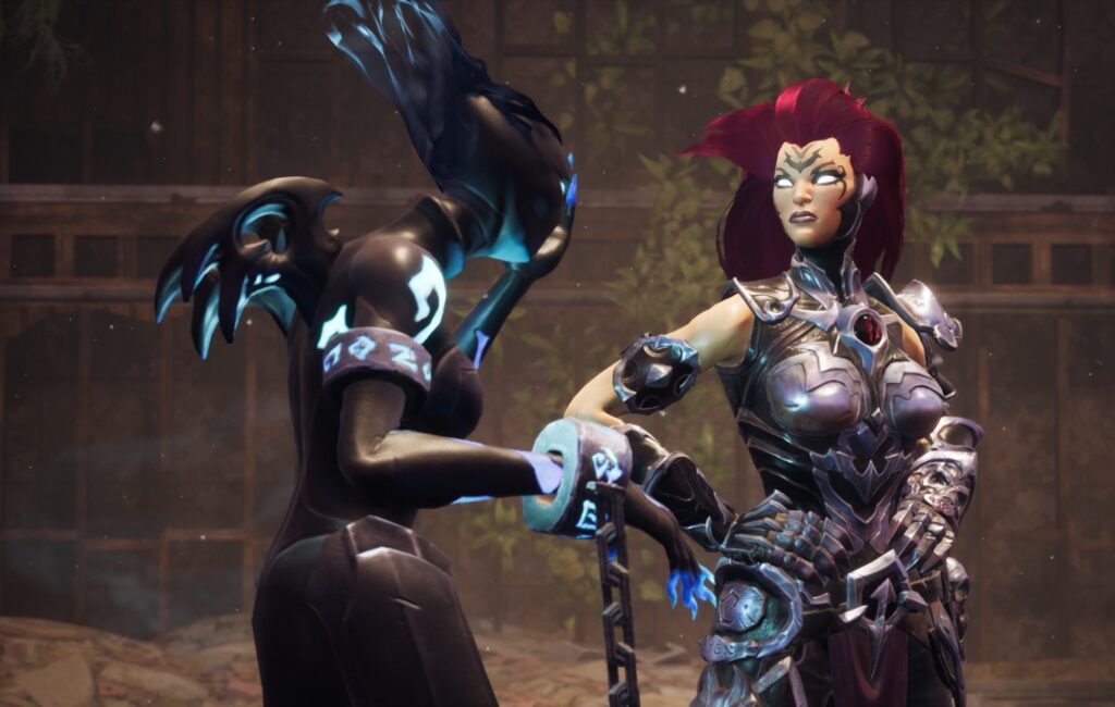 Two characters from Darksiders III stand in the middle of the screen facing each other