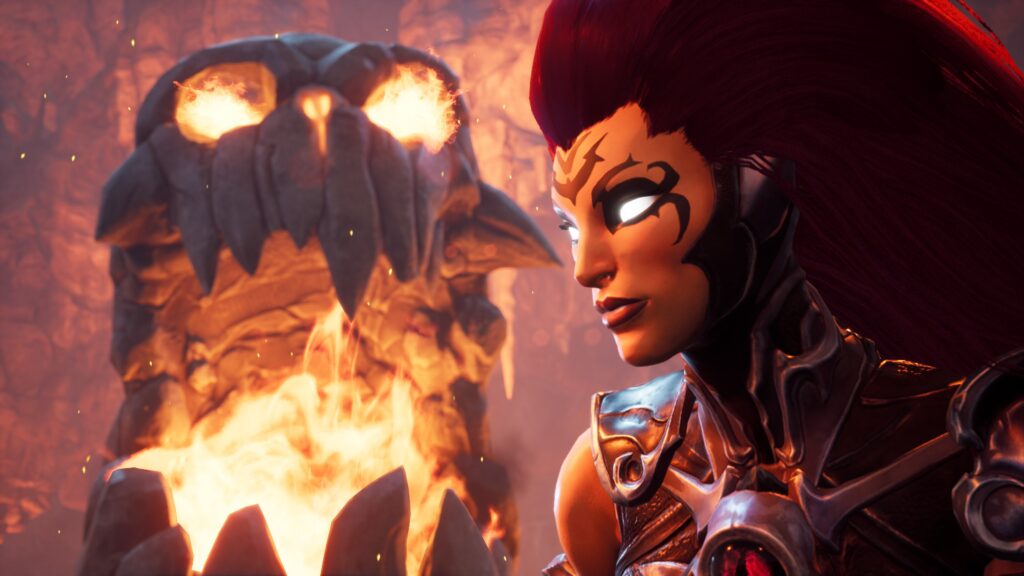 A stone gargoyle is in the background with fire coming out of its mouth and eyes, the head and shoulders of the character Fury are in the foreground