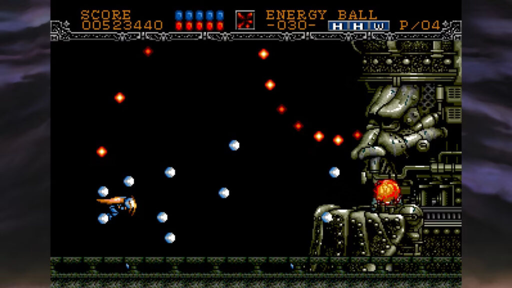 Gynoug protagonist, Wor, going head to head with a boss