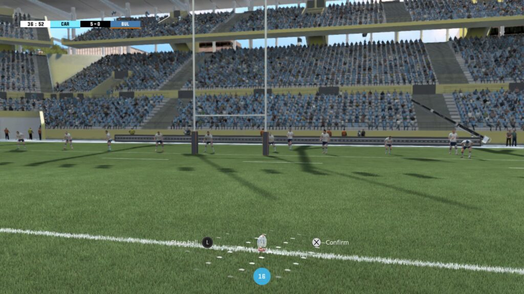 Players on the opposing team stand behind the touch line, in the foreground a ball is ready for a conversion kick to take place