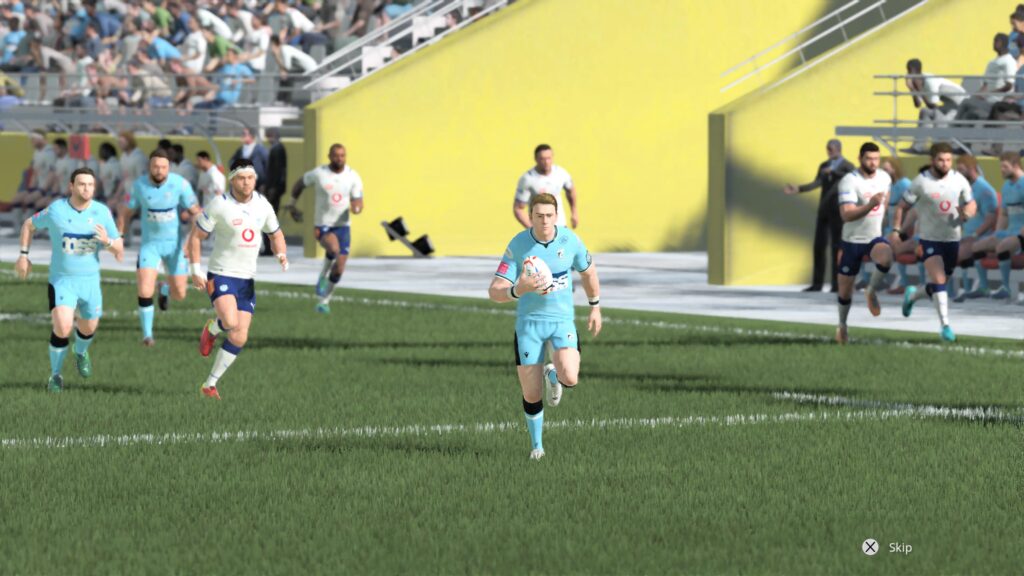 A player with the ball runs ahead of other players from both teams