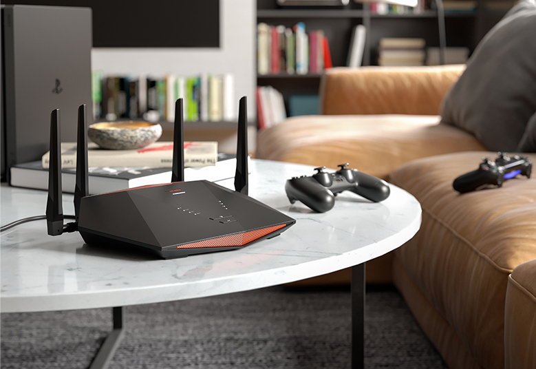The XR1000 on a white marbled coffee table next to a PlayStation controller.