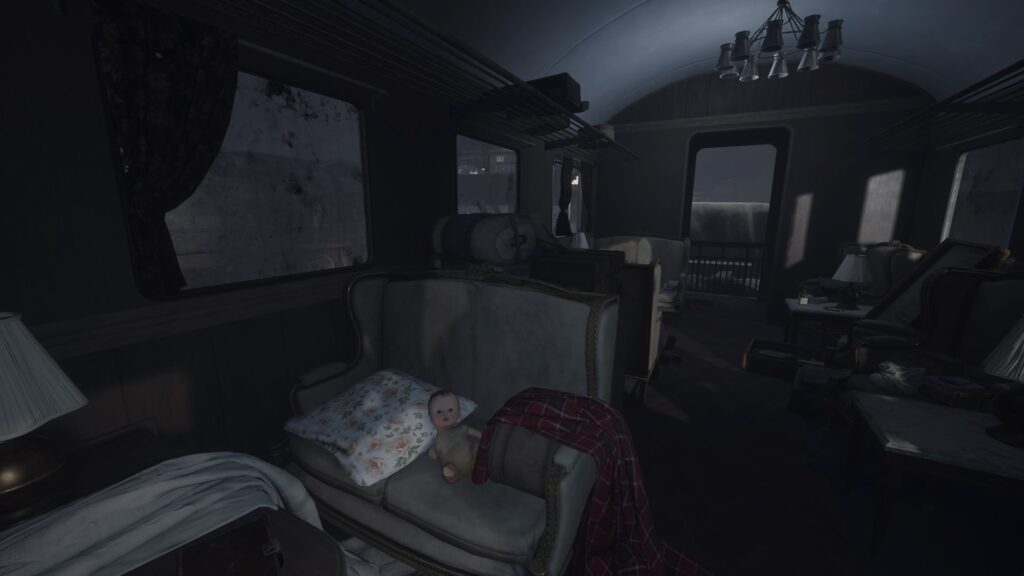 looking inside a train cabin at messy furniture and scattered belongings