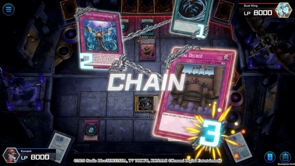 Large Yu-Gi-Oh! cards appear chained together obscuring gameplay behind