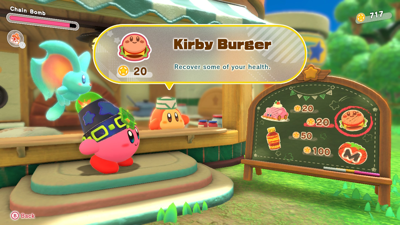 Kirby looks at the café menu, where you can buy a Kirby Burger.