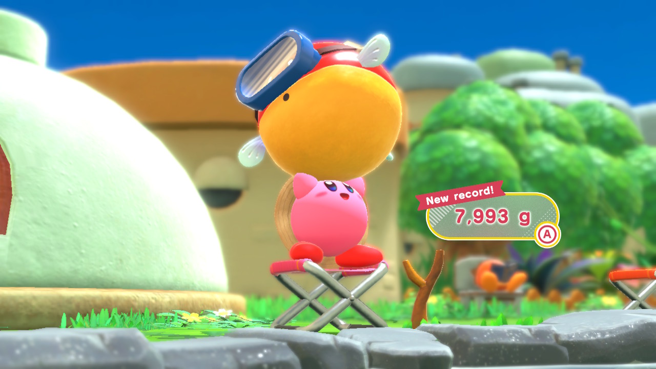 Kirby holding a large fish.