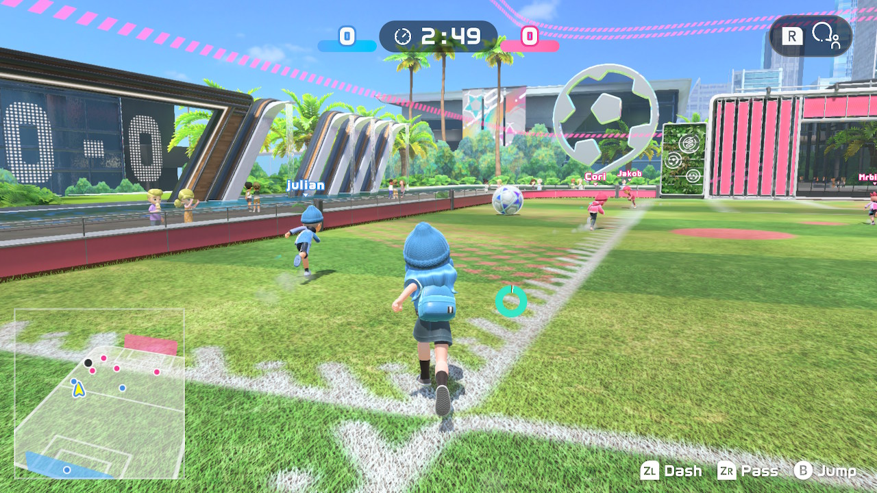 My character donned in blue runs across the pitch in football