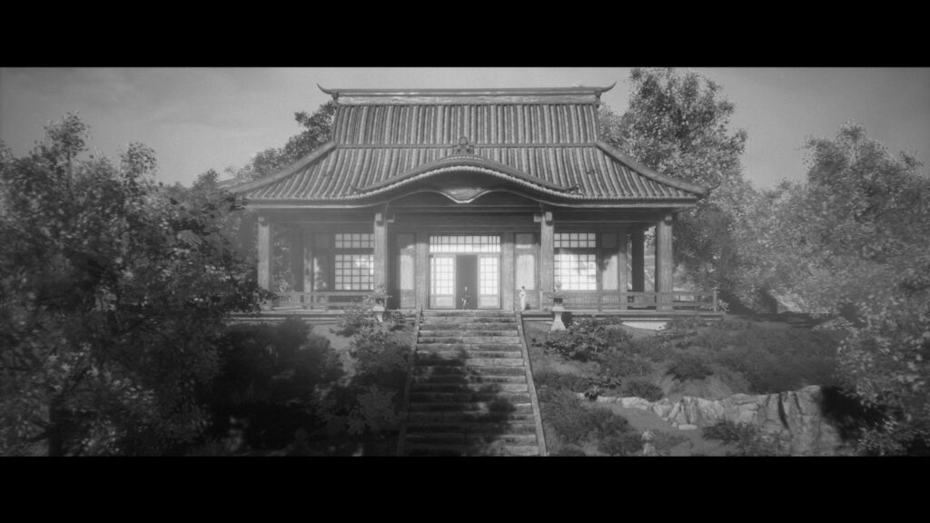 A Japanese-style building with stairs leading down from it.