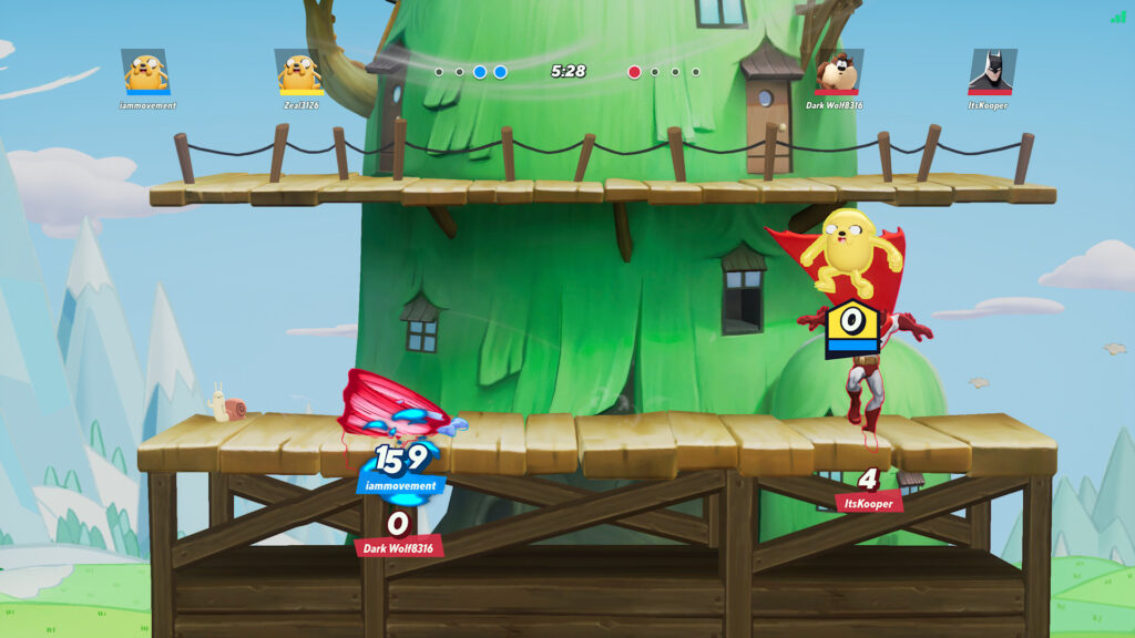 Taz is spinning in a tornado as jake jumps on batman