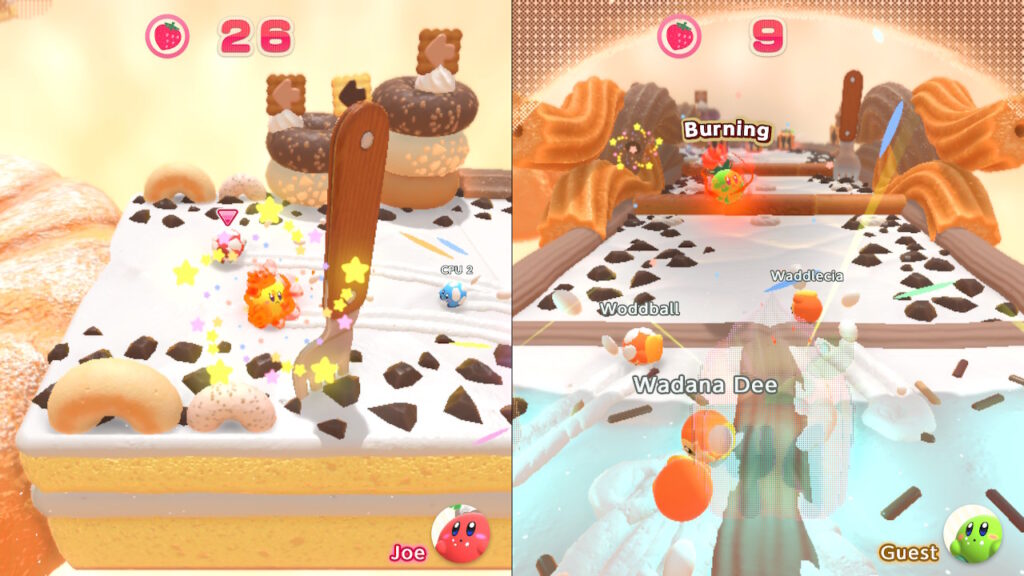 two kirbys moving through a level filled with cake and donuts