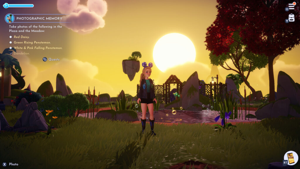 Protagonist stands next to a pond as a yellow sun sets in the background.