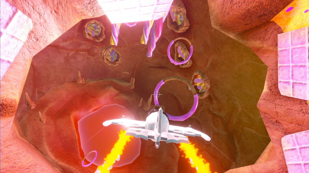A plane flies directly towards rings in a cave