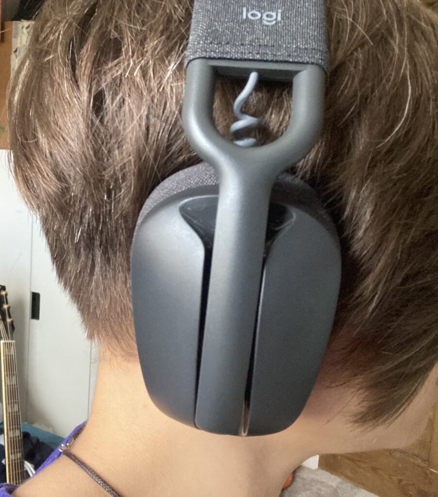 A side view of the headset being worn