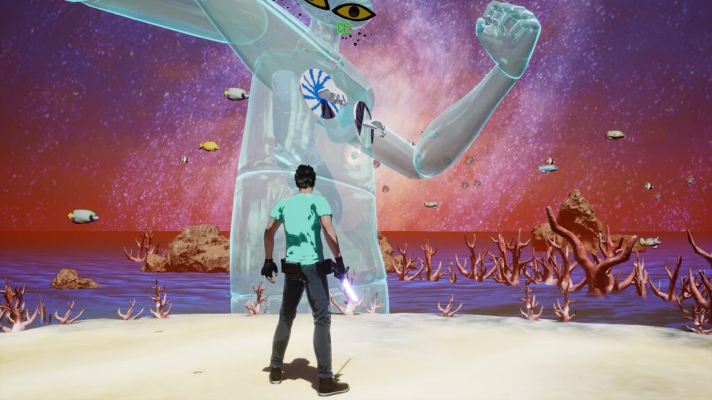 Travis is standing in front of a big blue monster
