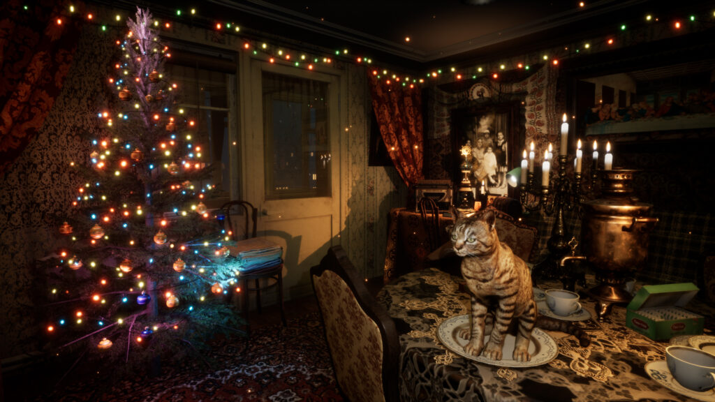 cat standing next to a christmas tree