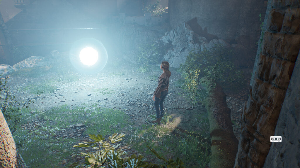 Elise stands in front of a ball of light with trees and ruins surrounding her