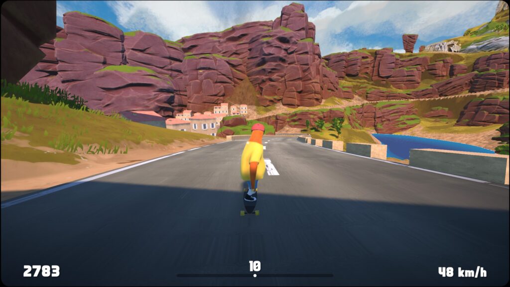 A sloth riding down a alpine style road, with houses in the background.