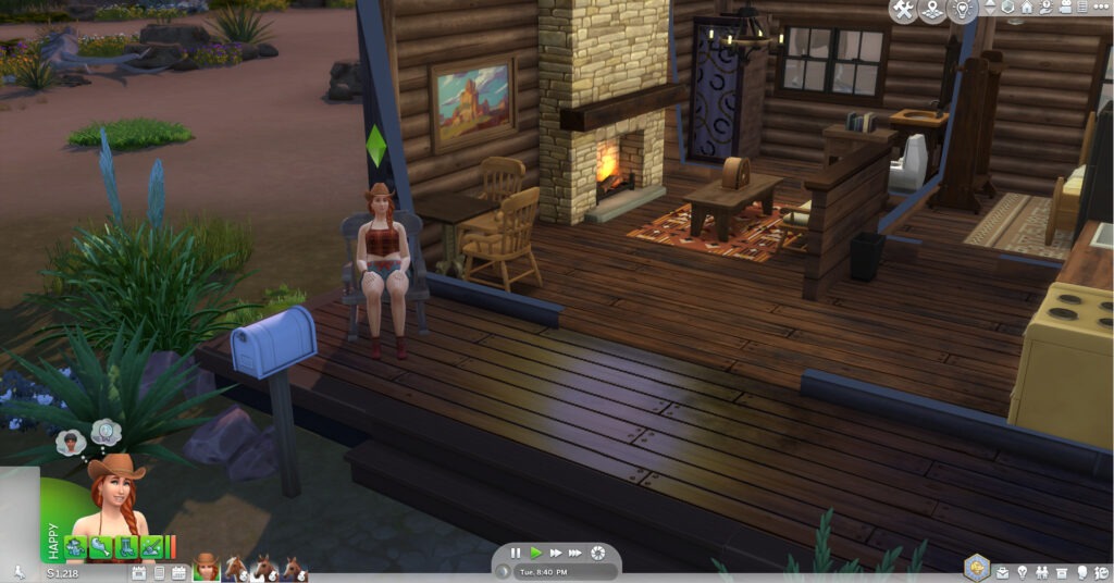 A Sim sitting on the porch of their home on a rocking chair.