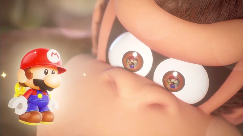 Donkey Kong seemingly transfixed by the toy Mario