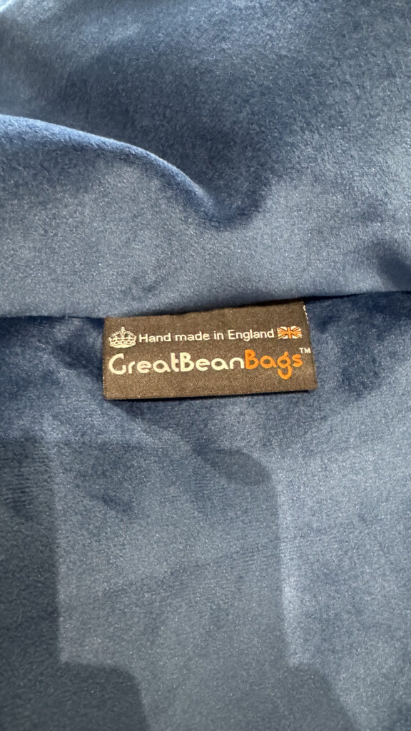 Photograph of the label of the beanbag, reading: hand made in England, GreatBeanBags (trademark)