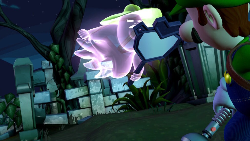 A pink ghost with a large green garden hat flies over Luigi. She is holding a heart-shaped mirror and hiding her face from Luigi's strobe light. Behind her there are stone walls and cemetary stones along with an old gangly tree.