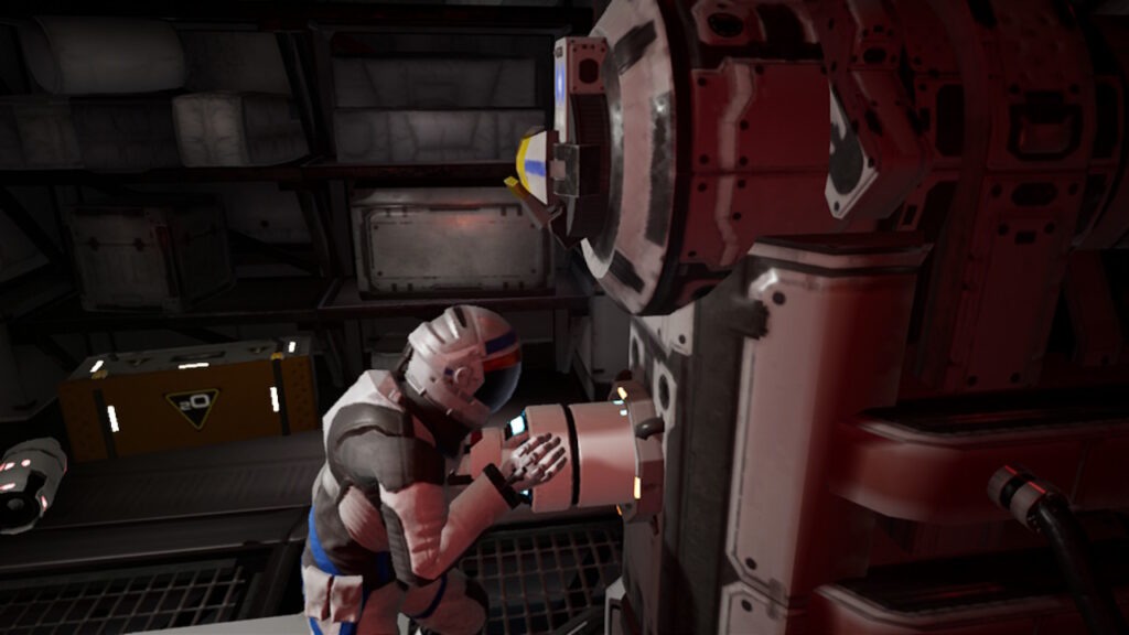 An astronaut pushes a cylinder into a machine to solve a puzzle. The large mechanical devices is made of metal and has wires coming out the side. The room is dark with only a small bit of light shining the way.