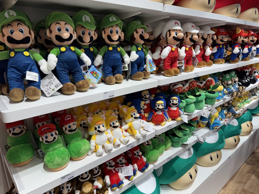A selection of mario and luigi plushies