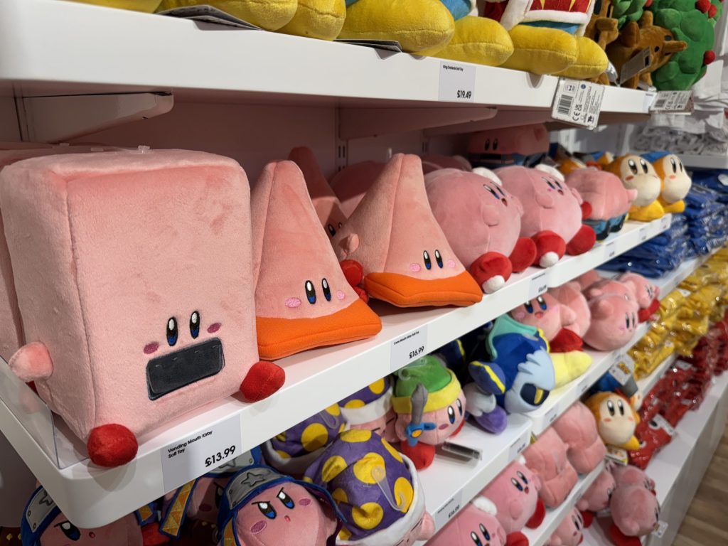 Kirby plushies on a self