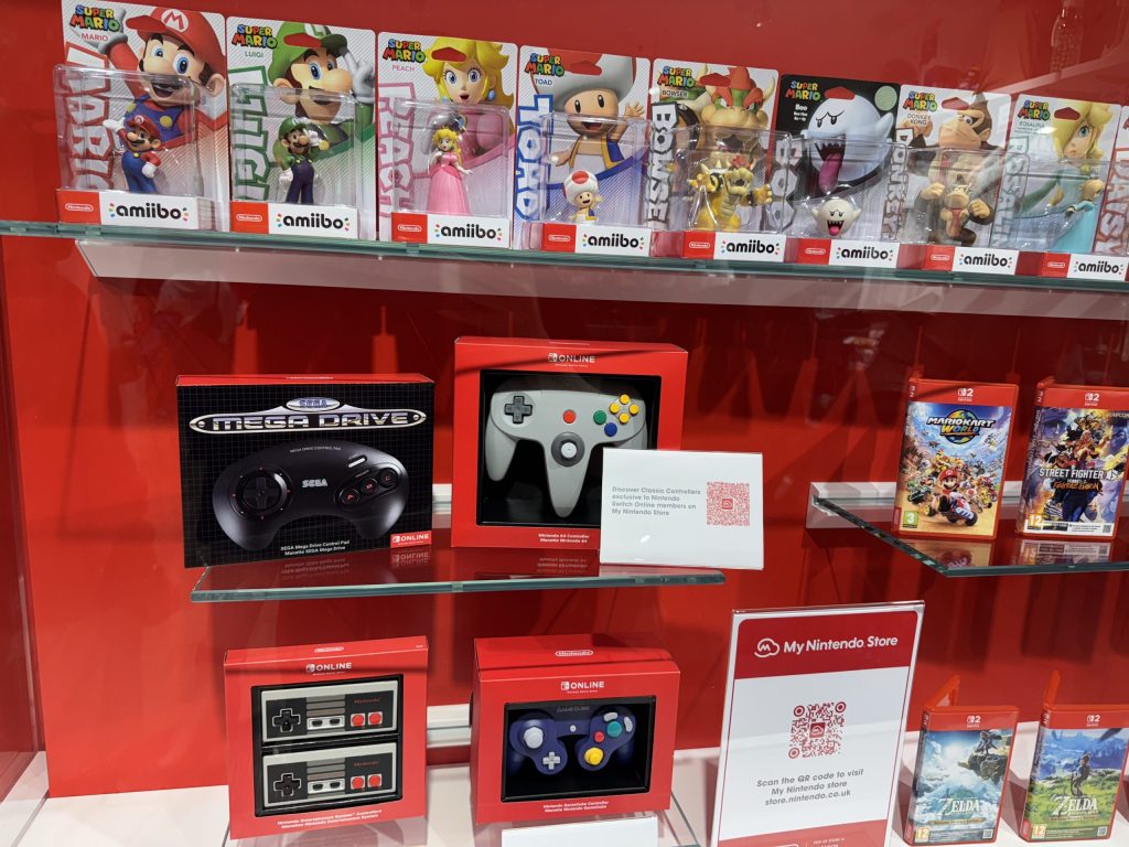 Switch 2 games and acessories are visible at the back of the store